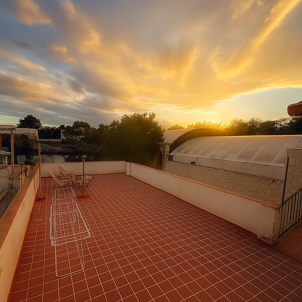 Panoramic rooftop terrace at Ballario Guest House with city and mountain views